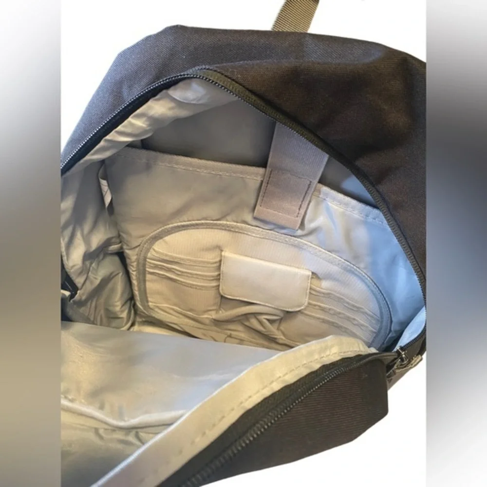 Quicksilver backpack book bag with laptop tablet sleeve. Orange and gray